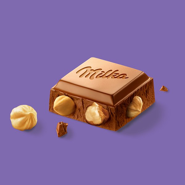 Milka Czekolada mleczna z całymi orzechami laskowymi 250 g